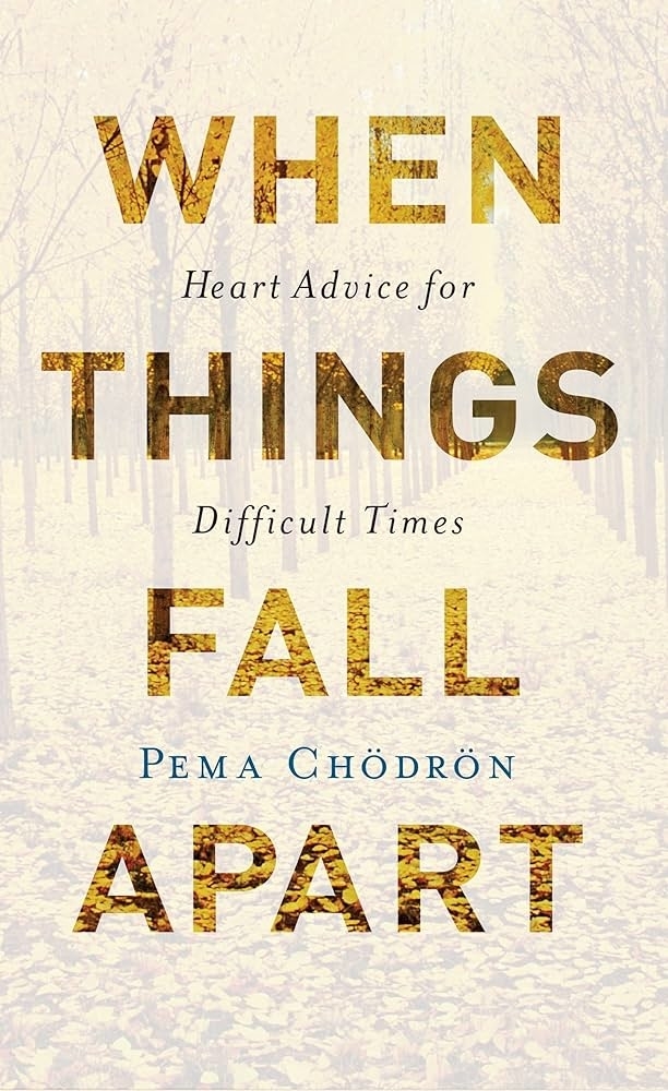 Book cover for &quot;When Things Fall Apart: Heart Advice for Difficult Times&quot; by Pema Chödrön. The text is set against a background of a tree-lined path