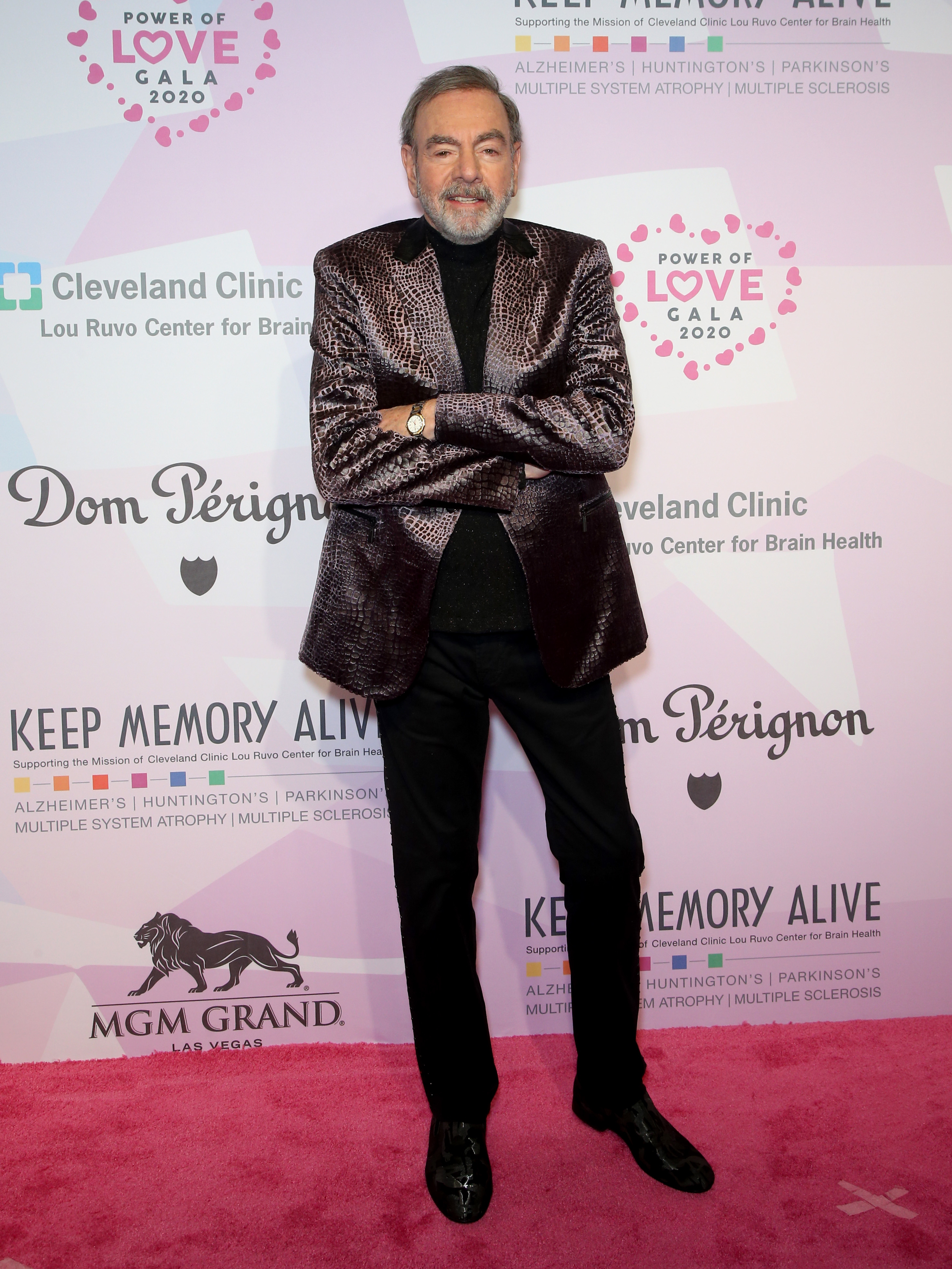 Neil Diamond in a black turtleneck and shimmering blazer at the Power of Love Gala 2020 red carpet event