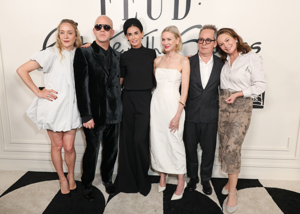 Chloë Sevigny, Ryan Murphy, Demi Moore, Naomi Watts, Tim Minear, and Diane Lane pose together in stylish modern outfits at an event
