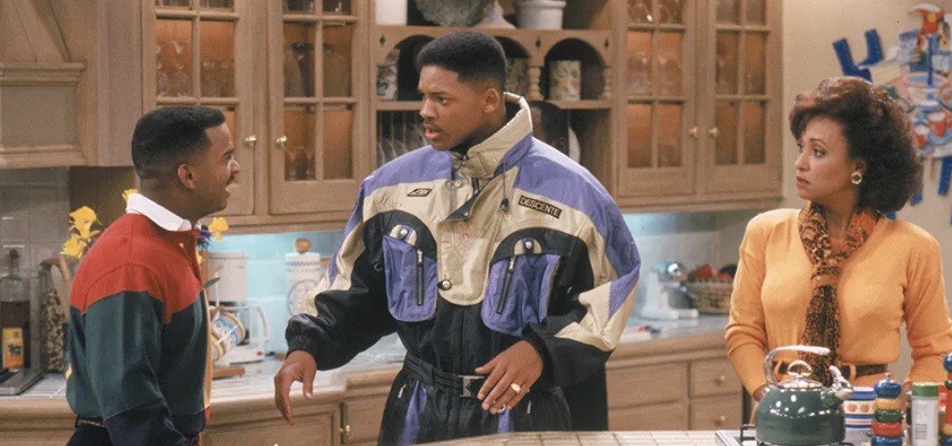 Alfonso Ribeiro, Will Smith, and Karyn Parsons in a kitchen scene from &quot;The Fresh Prince of Bel-Air.&quot; Will wears a sporty jacket, Alfonso and Karyn wear casual clothes