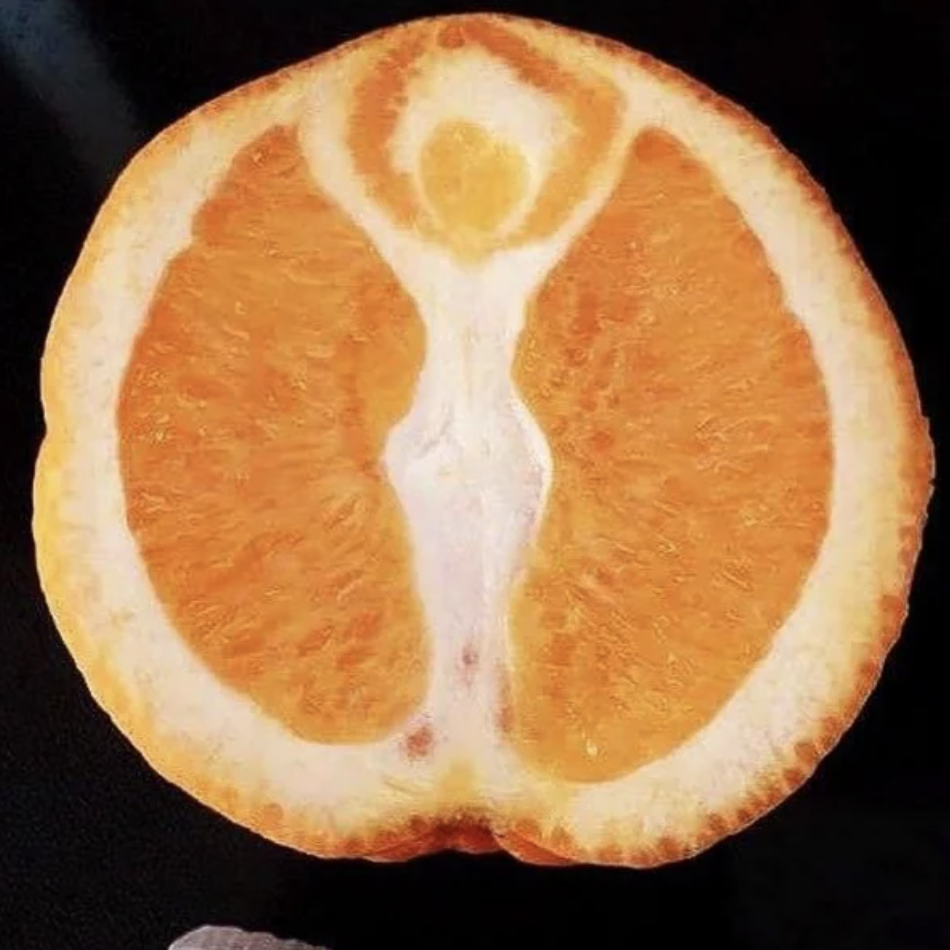A close-up of an orange slice featuring a unique pattern resembling a person with arms raised