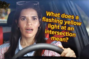 America Ferrera looks surprised while driving. Caption says, "What does a flashing yellow light at an intersection mean?"