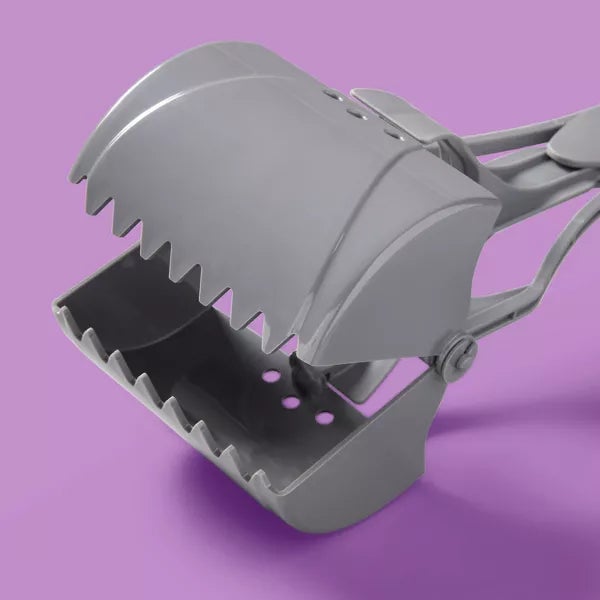 Gray pooper-scooper with serrated edges
