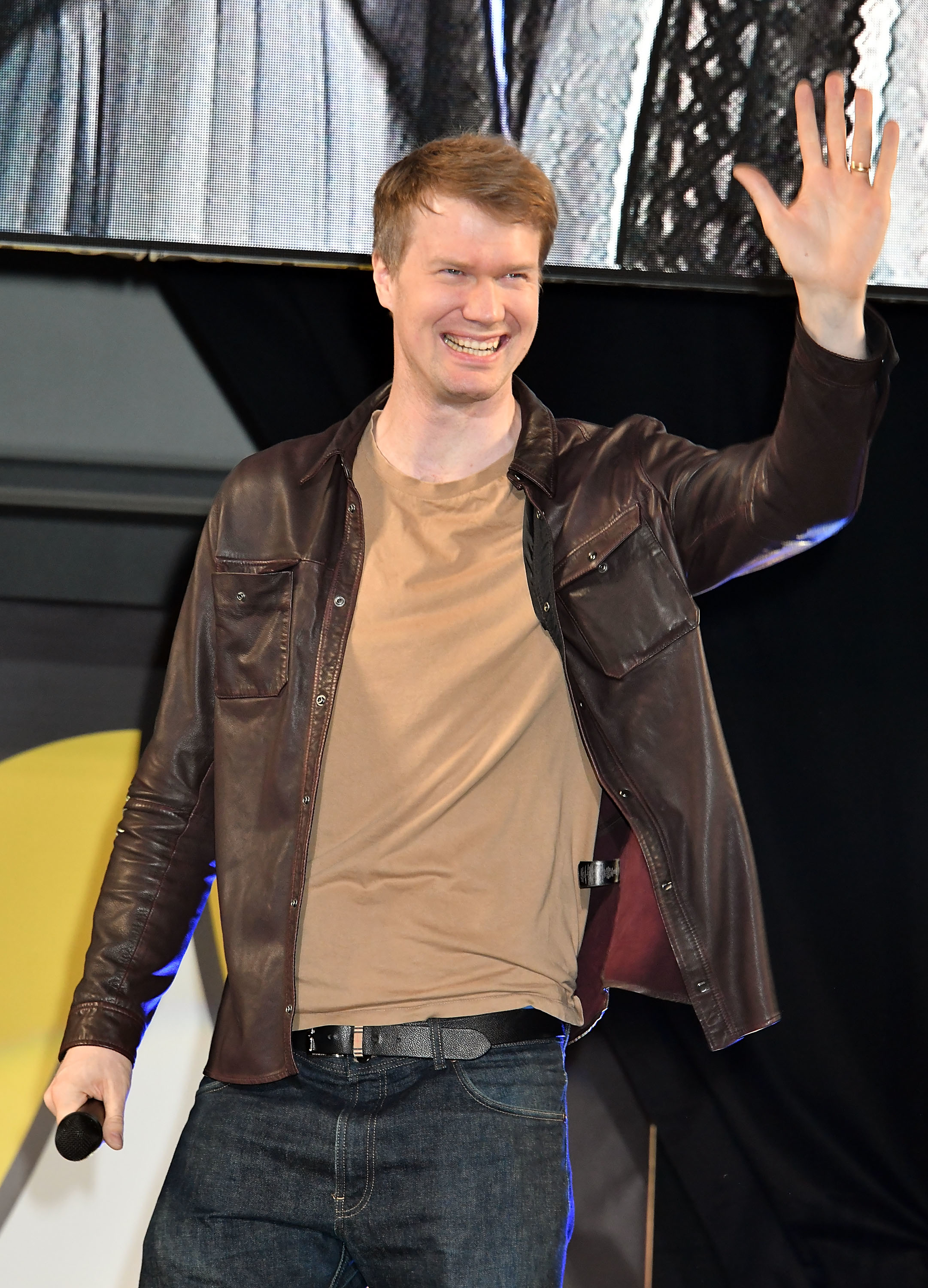 Joonas Suotamo in a leather jacket, t-shirt, and jeans at Osaka Comic Con 2023