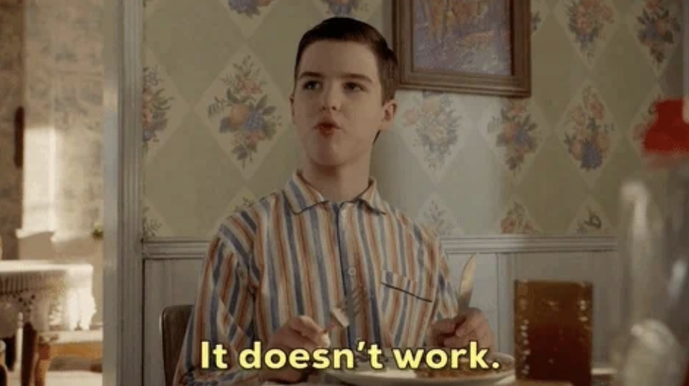 A young boy in a striped shirt sits at a dining table. Text at the bottom reads, "It doesn't work."