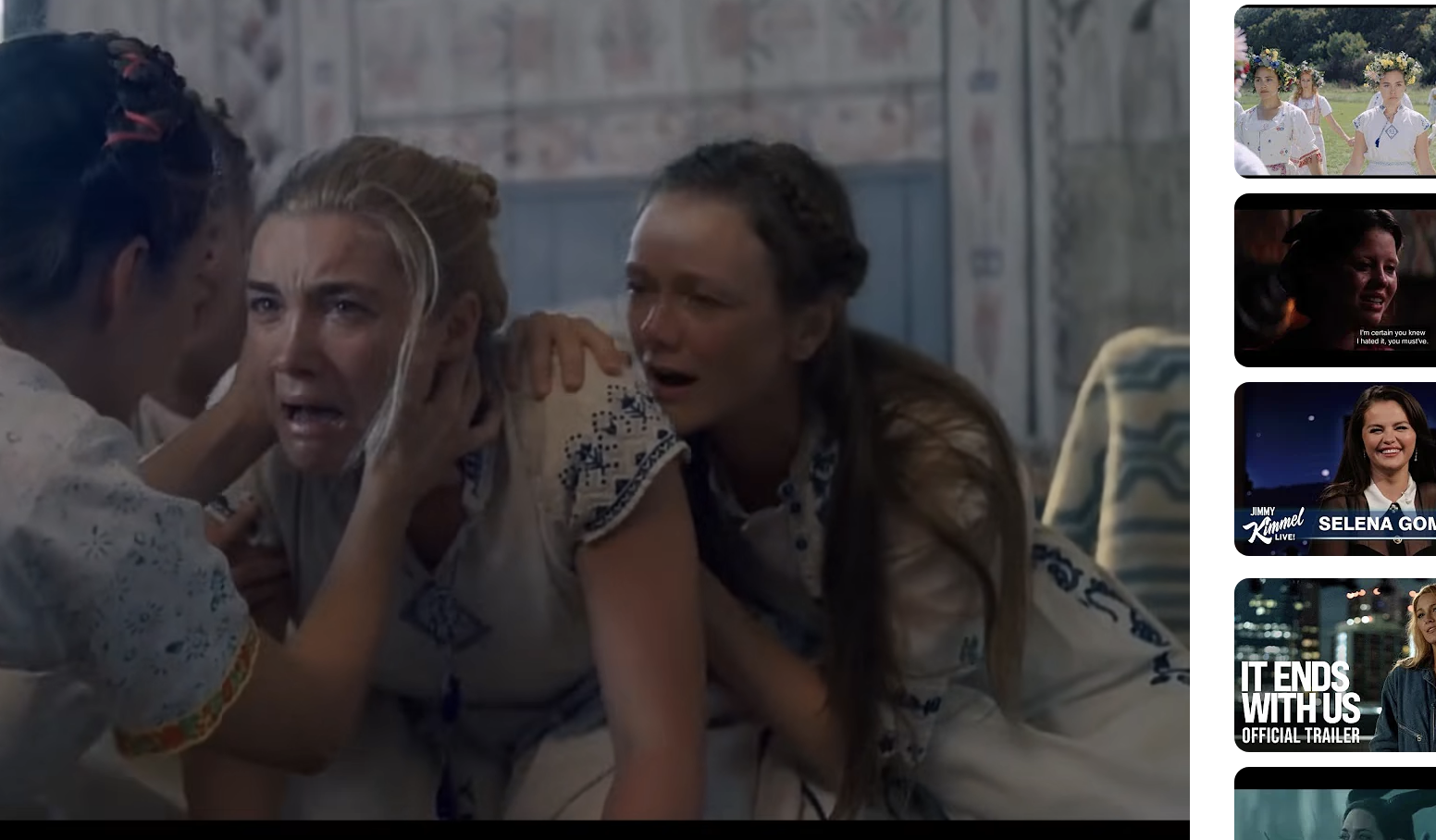 A YouTube video titled &quot;Midsommar (2019) | Dani&#x27;s Crying Scene (HD)&quot; shows Florence Pugh crying while multiple women in traditional clothing console her