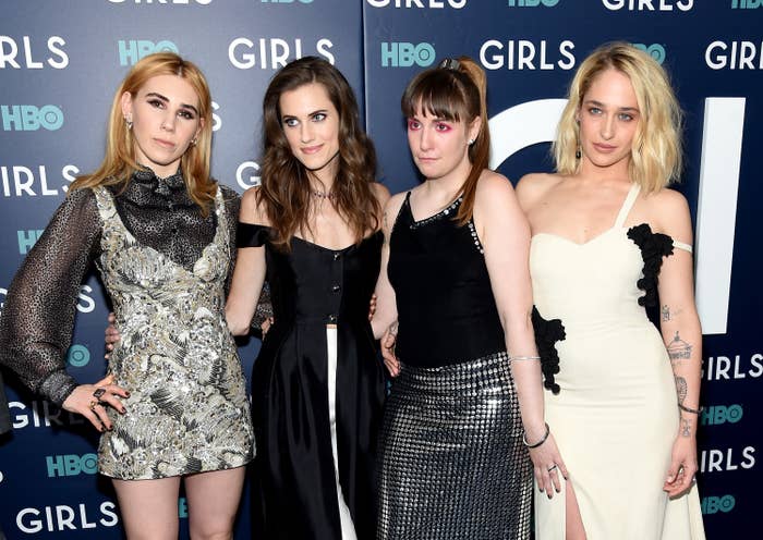 Zosia Mamet, Allison Williams, Lena Dunham, and Jemima Kirke at the "Girls" HBO premiere. They are posing together, each wearing stylish dresses