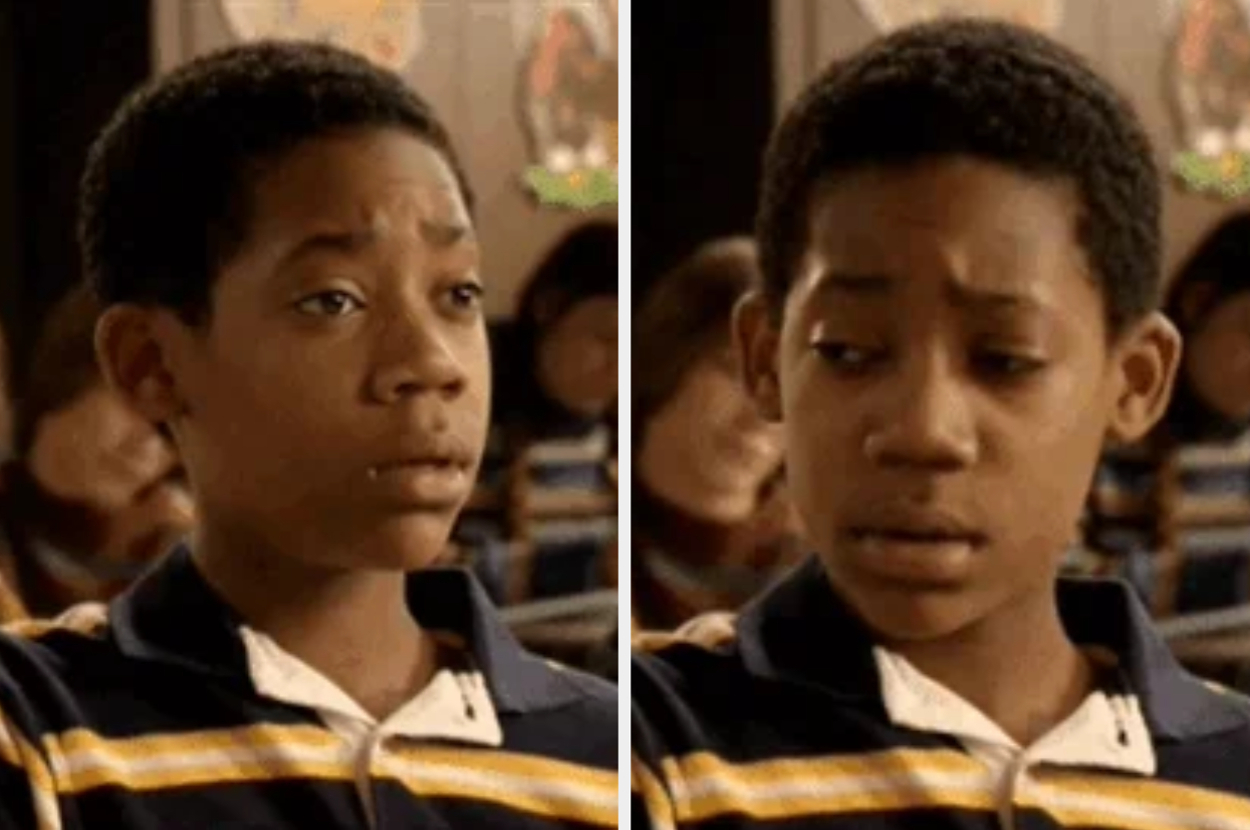 Tyler James Williams in a classroom scene from "Everybody Hates Chris," with expressions of confusion and concern