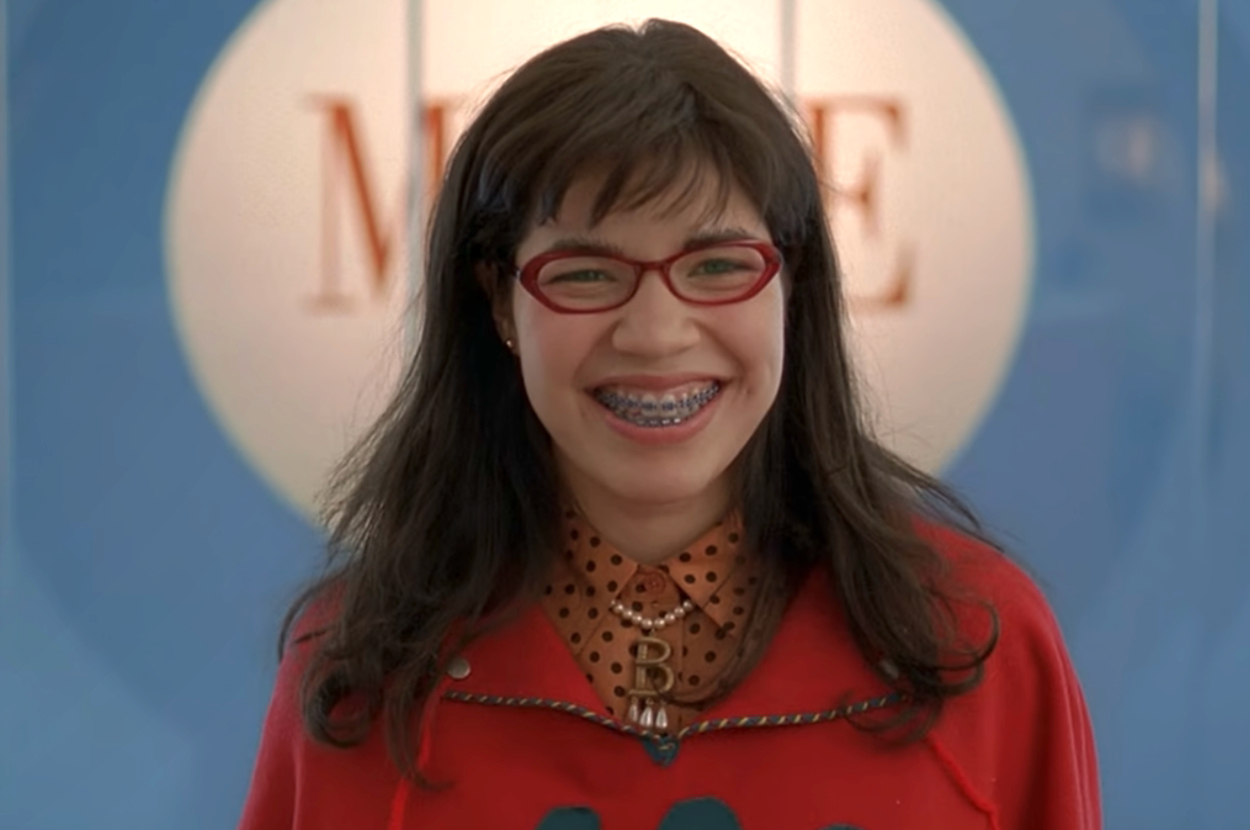 America Ferrera smiling brightly as Betty on Ugly Betty