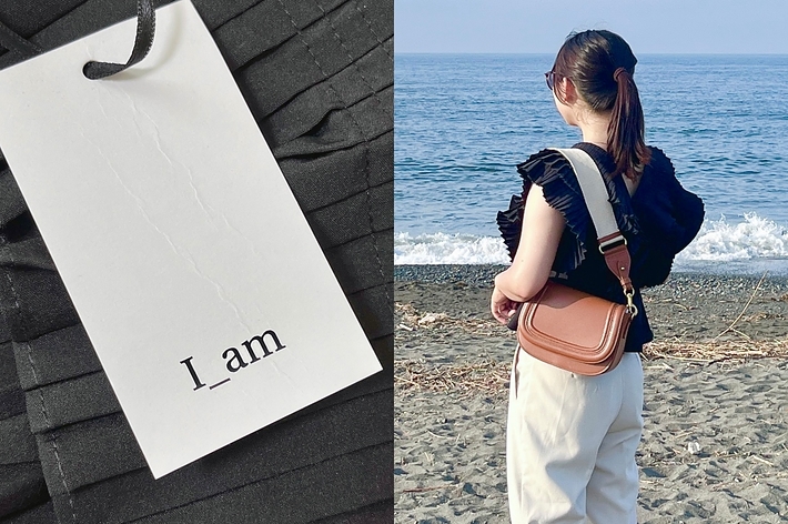 波打ち際に立つ女性の後ろ姿と、「I am」と書かれたタグ。