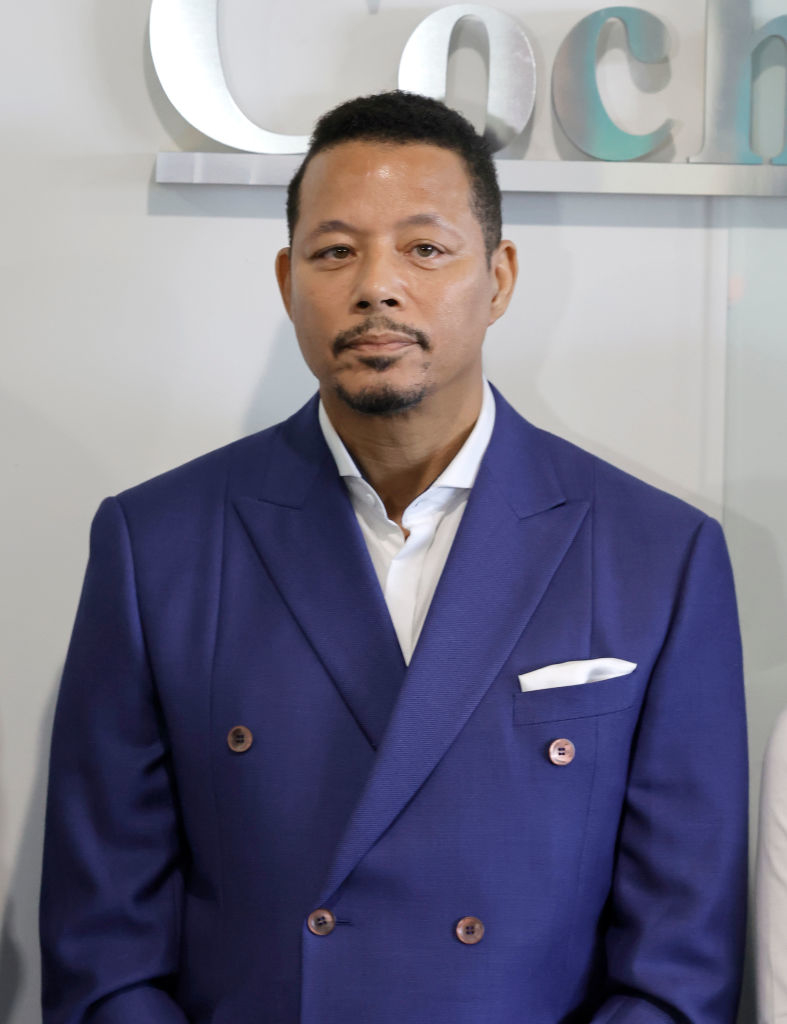 Terrence Howard in a double-breasted suit with a collared shirt