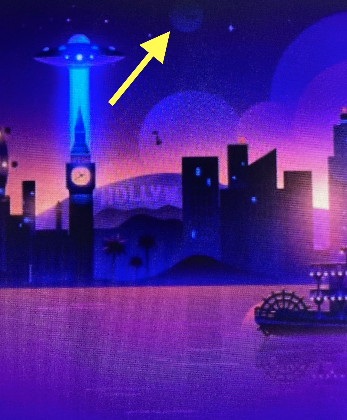 Illustration of an alien spaceship over a cityscape marked "Hollywood" with a yellow arrow pointing to a faded spherical object in the sky