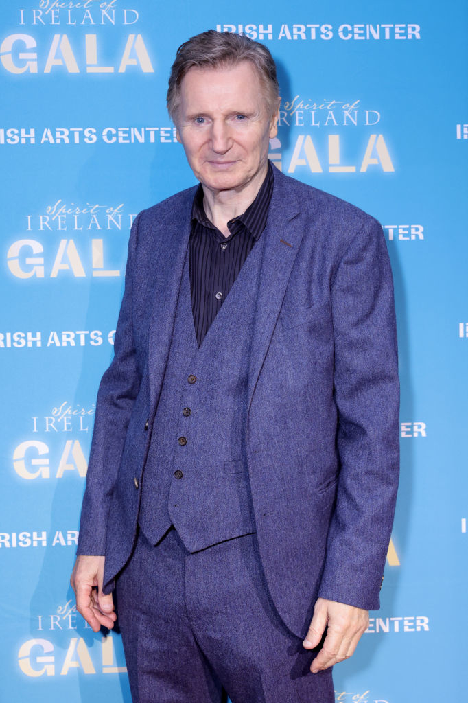 Liam Neeson at the Irish Arts Center Spirit of Ireland Gala, wearing a three-piece suit with a patterned shirt