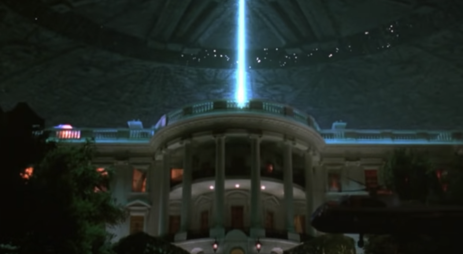 A scene from the movie "Independence Day" showing a beam of light from an alien spaceship targeting the White House