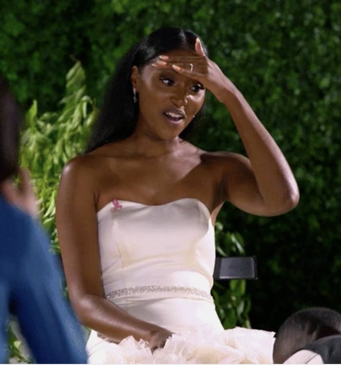 Bride white wedding dress looking surprised