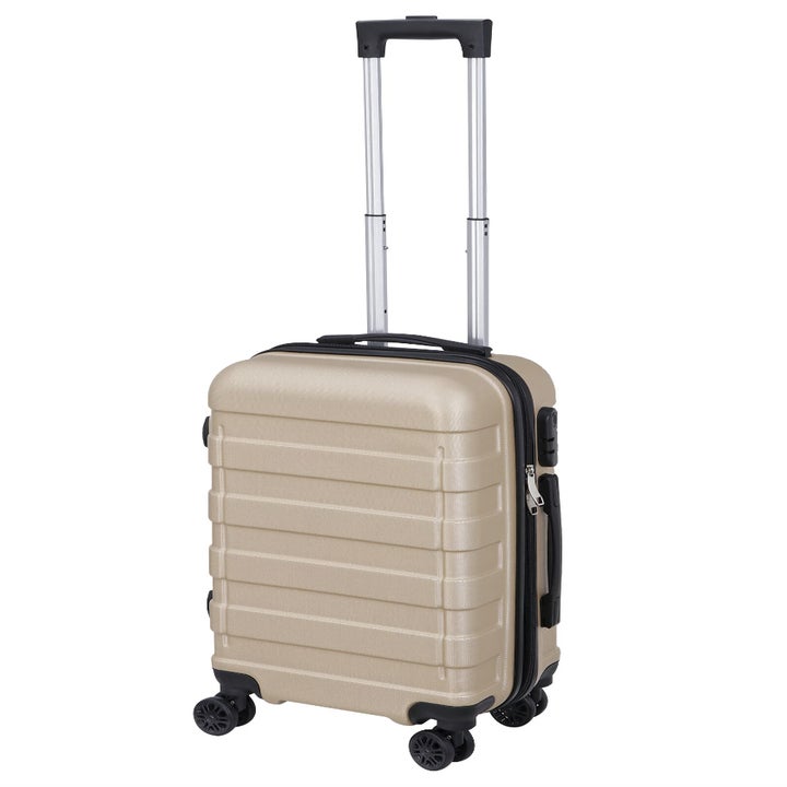 A champagne rolling carry on suitcase