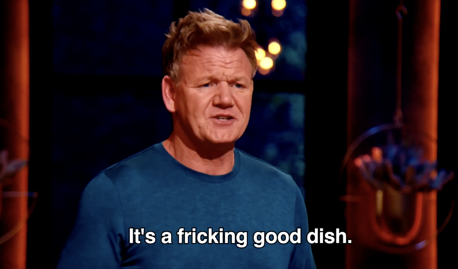 Gordon Ramsay in a blue shirt on a show set, saying, &quot;It's a fricking good dish.&quot;