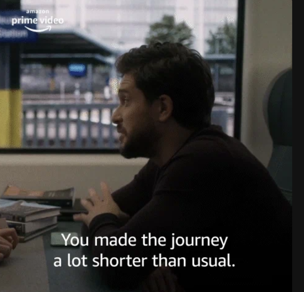 Man leaning on a table, speaking to another person. Text reads: You made the journey a lot shorter than usual