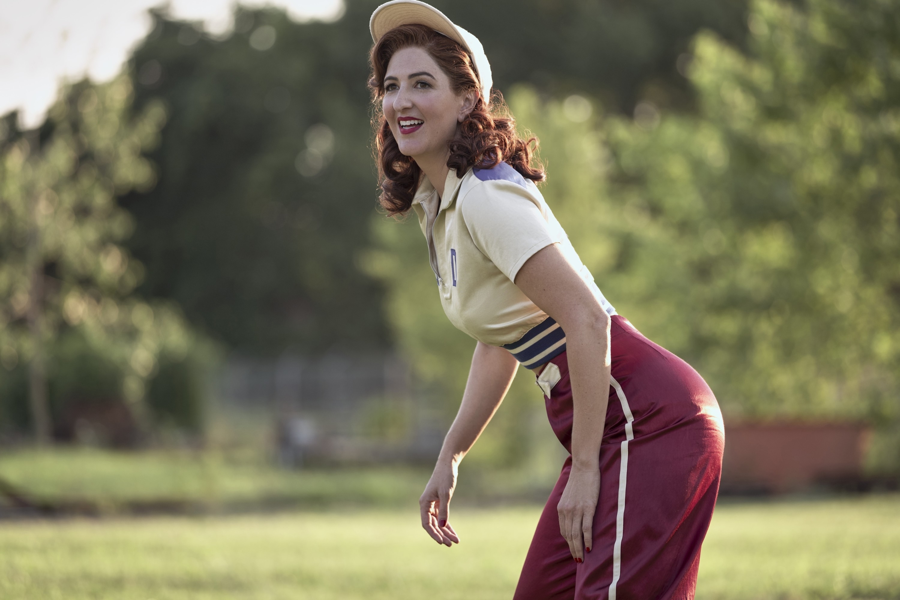 D'Arcy Carden in a retro baseball uniform in a scene from &quot;A League of Their Own&quot;
