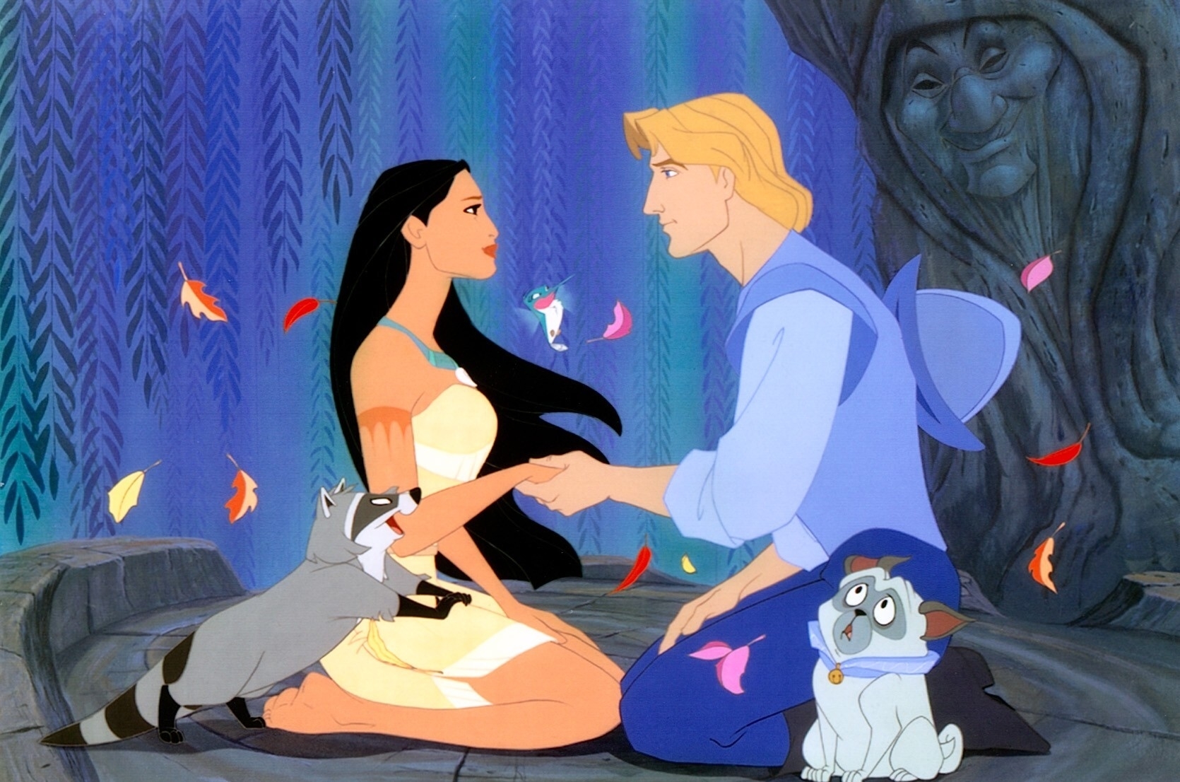 Pocahontas and John Smith hold hands while surrounded by Meeko, Flit, Percy, and Grandmother Willow in a scene from "Pocahontas"