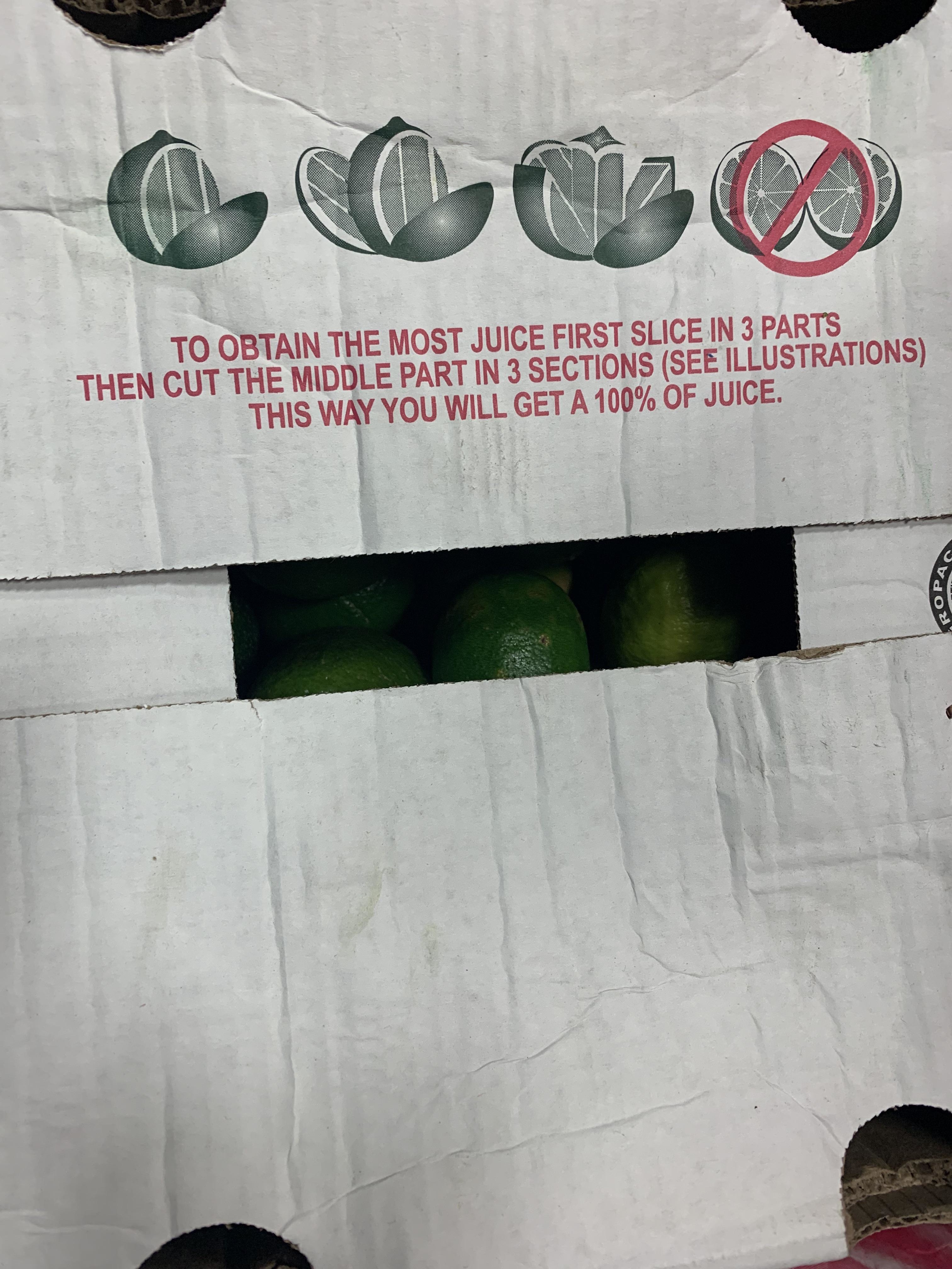 Box of limes with instructions on slicing to obtain the most juice, suggesting cutting into three sections. Teaches that this method results in 100% juice
