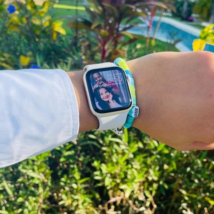 reviewer wearing the smartwatch on their wrist