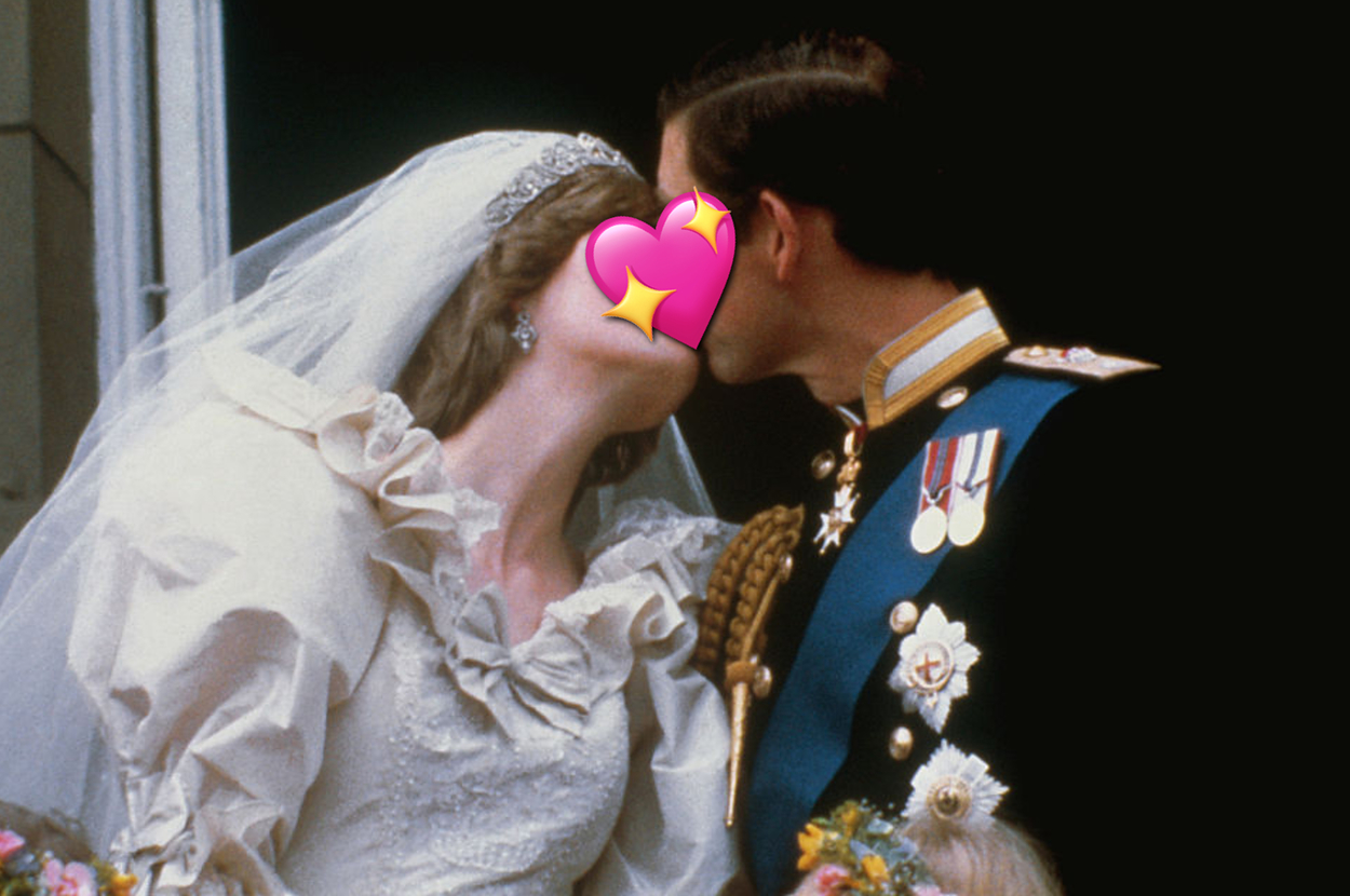 Princess Diana and Prince Charles share a kiss on a balcony in their wedding attire