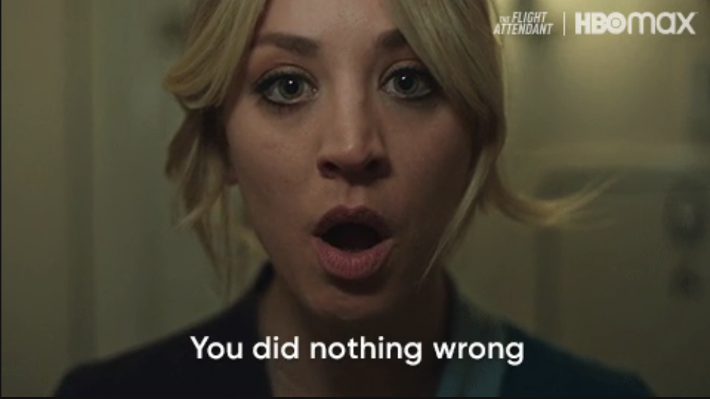 Kaley Cuoco's character with a surprised expression, text overlaid: "You did nothing wrong," from the HBO Max series "The Flight Attendant."