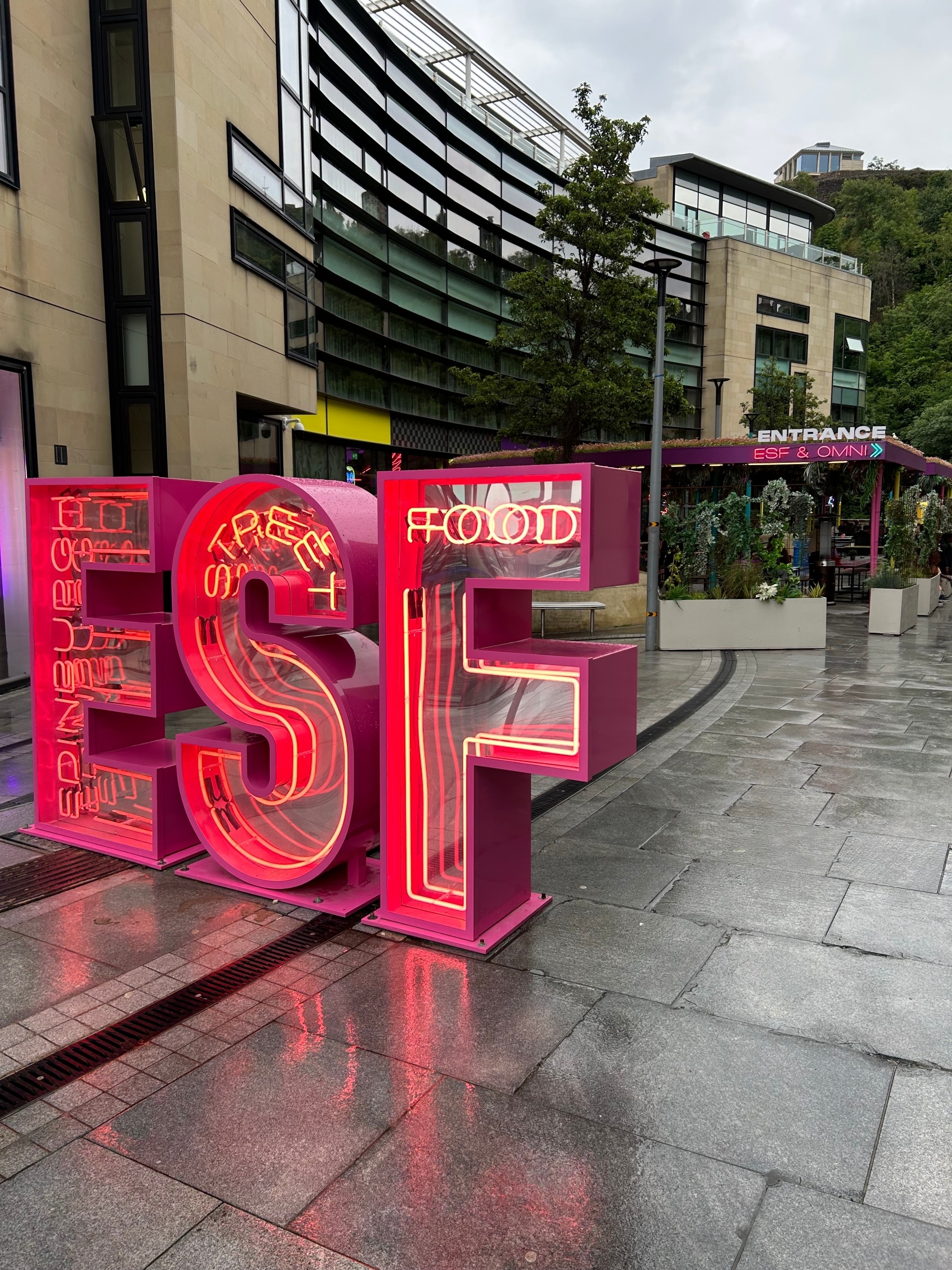 neon ESP sign outside food hall