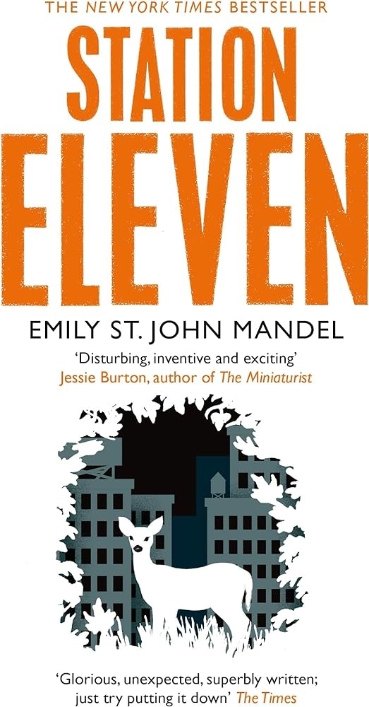 Cover of the book "Station Eleven" by Emily St. John Mandel, featuring a deer in front of a cityscape and praise from Jessie Burton and The Times