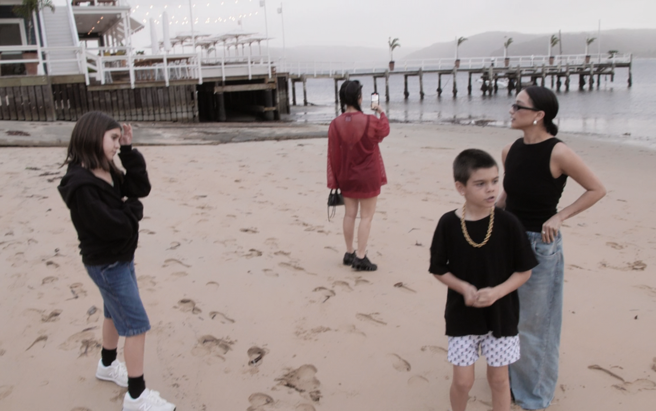 Kourtney and her kids on the beach