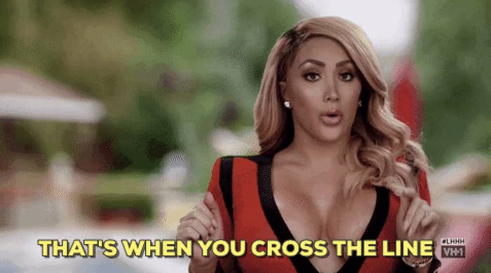 Woman in a red and black outfit saying &quot;That's when you cross the line&quot; with hand gestures