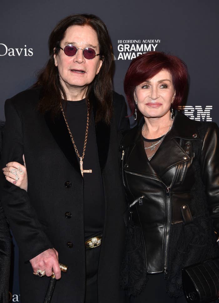 Ozzy Osbourne in a black outfit and Sharon Osbourne in a leather jacket at a Grammy Awards event