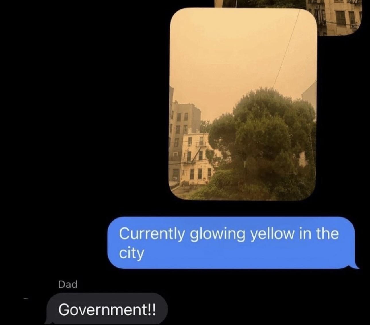 A text exchange with an image of a city glowing yellow. The sender says, "Currently glowing yellow in the city." The reply from 'Dad' says, "Government!!"