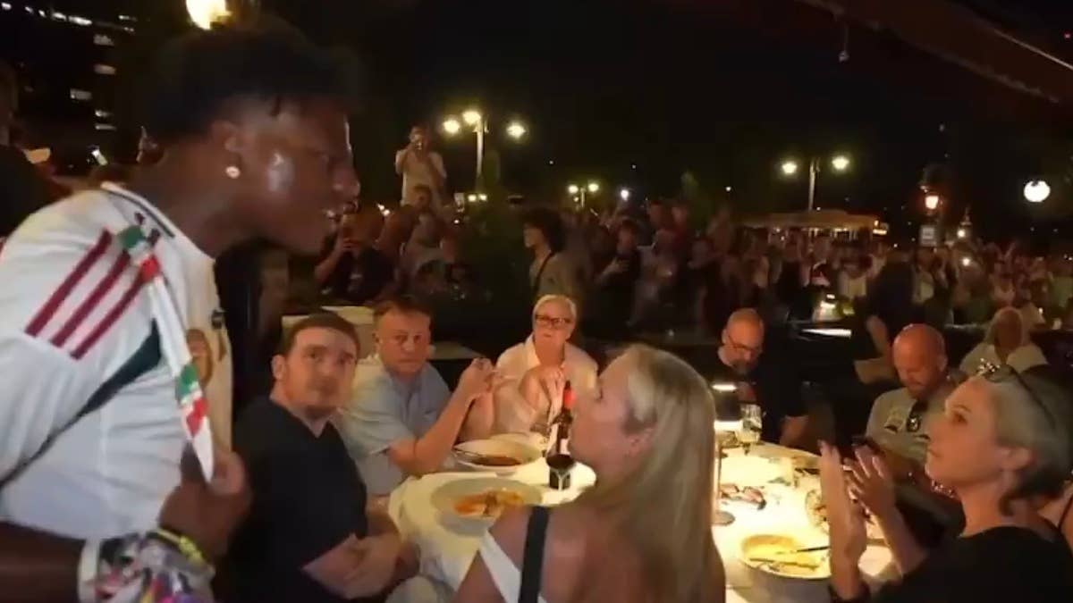 The confrontation went down as a mob of fans followed the streamer through a Budapest eatery.