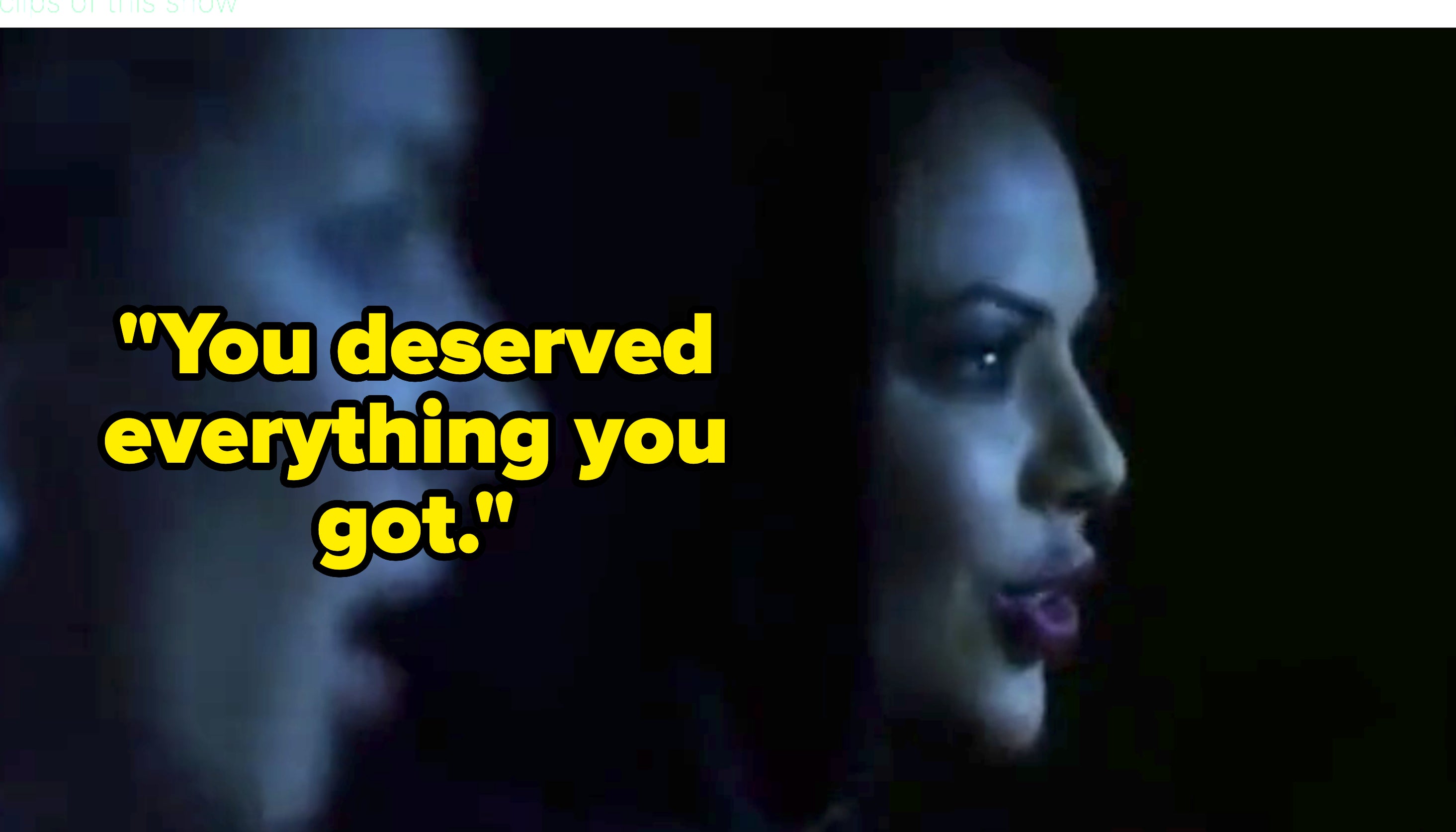 Two characters from Pretty Little Liars, Mona and another person appear in a dark scene; Mona is in focus, looking intently forward, wearing dark clothing