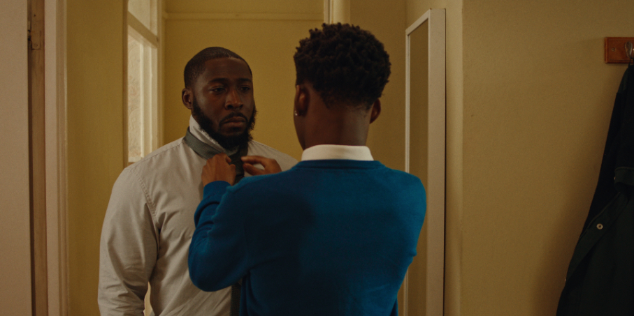 A wholesome father-son moment.