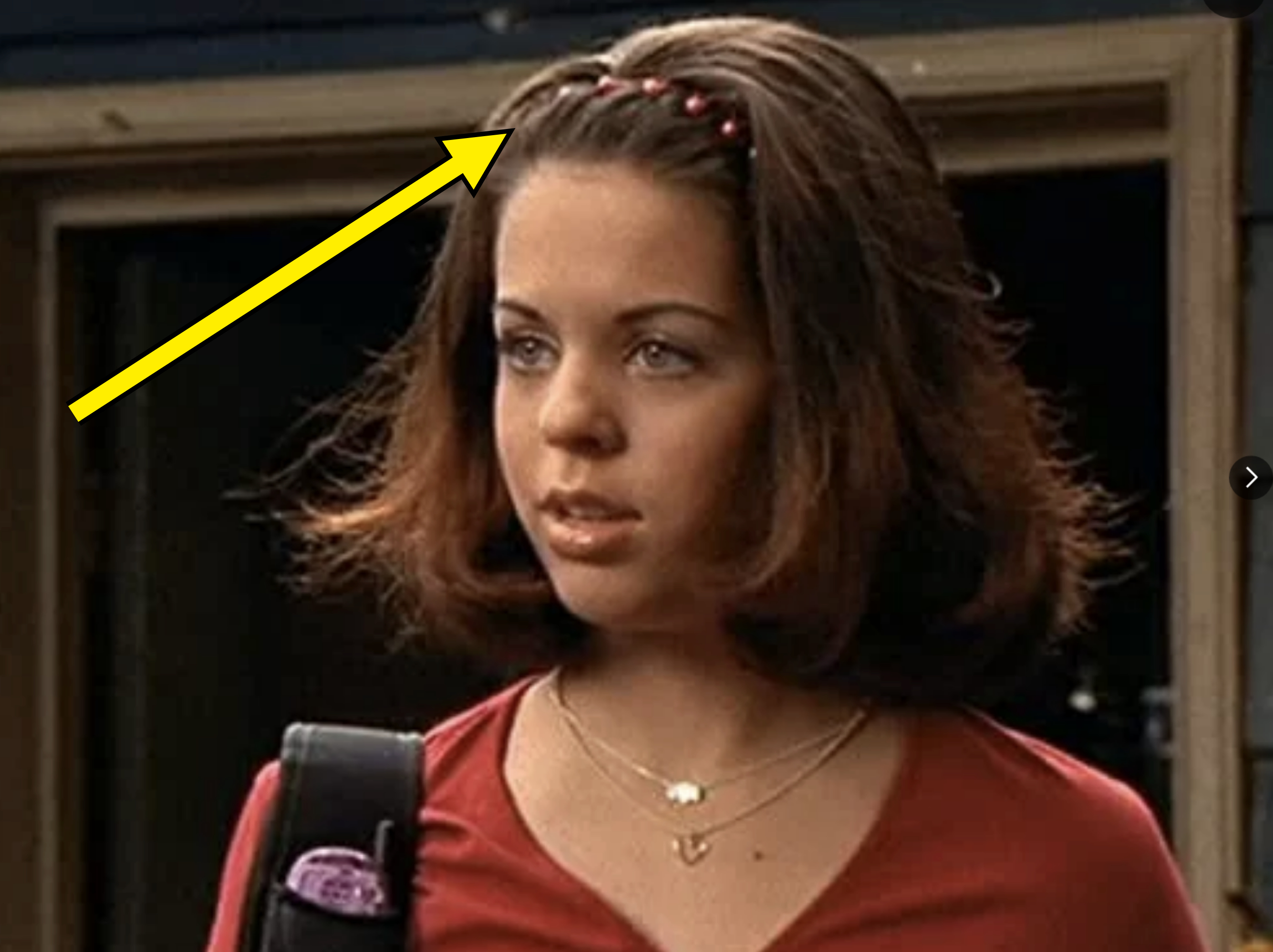 A character from &quot;Degrassi&quot; wearing a zigzag headband