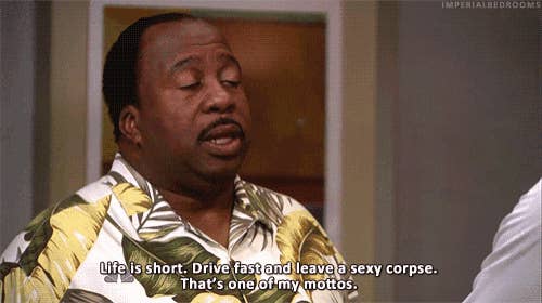 Stanley Hudson from "The Office" in a Hawaiian shirt says, "Life is short. Drive fast and leave a sexy corpse. That’s one of my mottos."