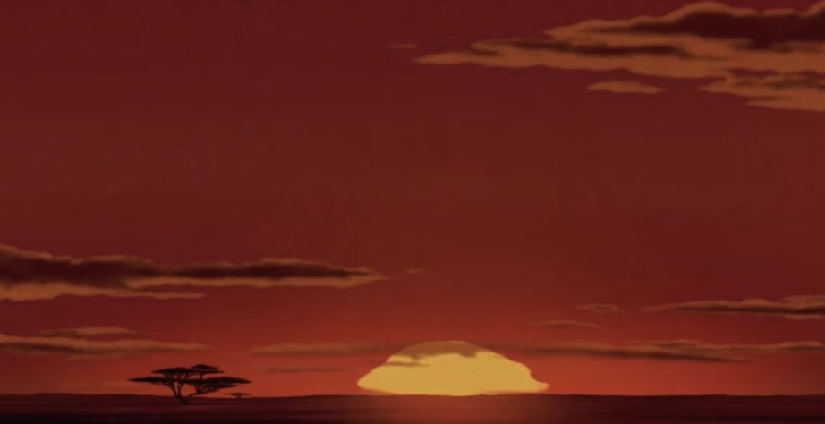 Sunrise scene from The Lion King, showing the sun rising over an African landscape with a silhouette of a tree