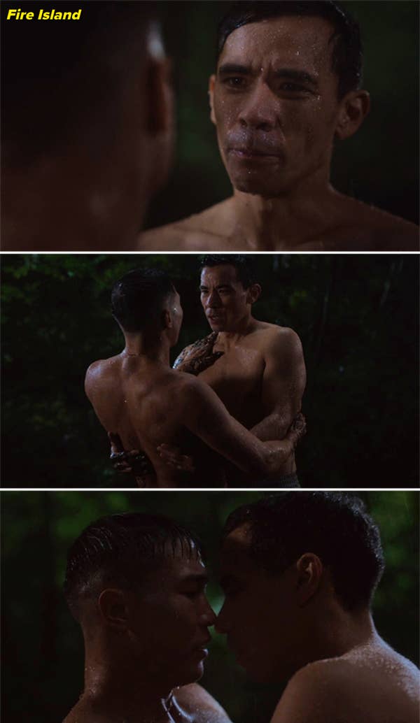 Three panels show two shirtless men – Joel Kim Booster and Conrad Ricamora – standing in the rain, sharing an intimate moment. In the final panel, they lean in for a kiss in &quot;Fire Island&quot;