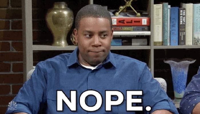 Kenan Thompson sitting and looking to the side with a slight smile, with the text "NOPE." appearing at the bottom of the image