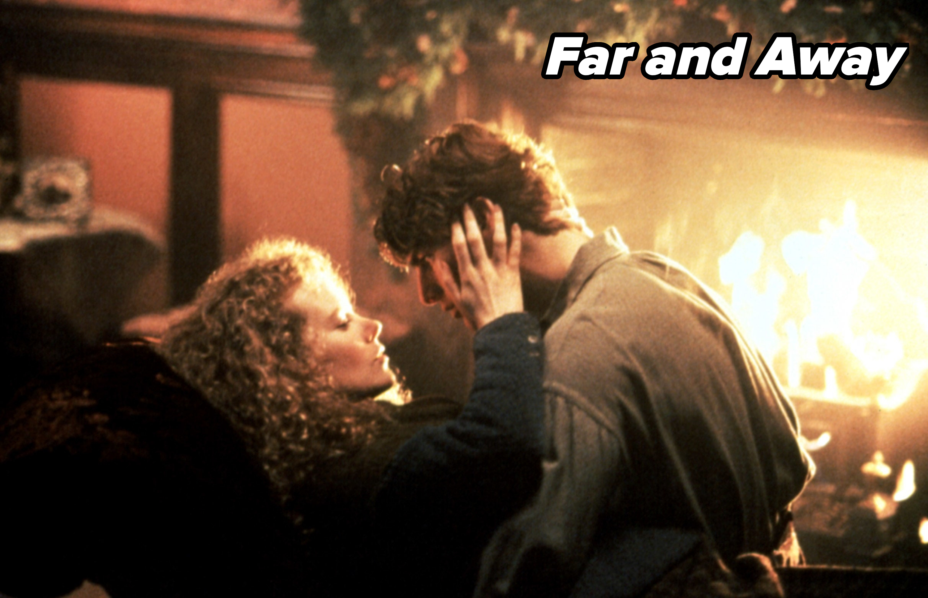 Nicole Kidman and Tom Cruise sit closely, gazing into each other's eyes, in a cozy scene by a fireplace from the movie "Far and Away"