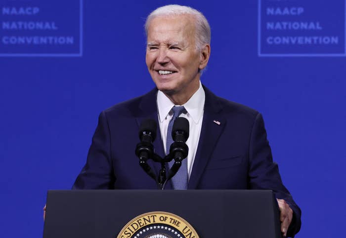 President Joe Biden speaks at the NAACP National Convention podium