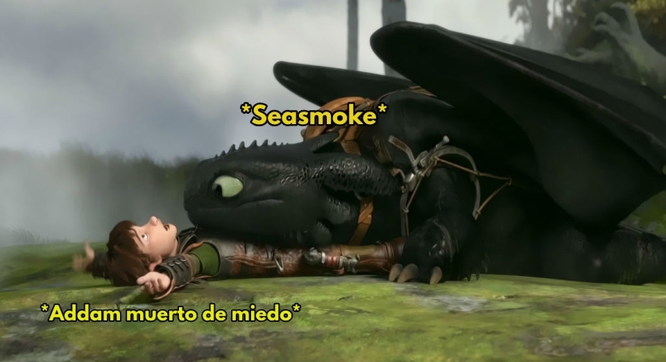 Hipo recostado en el suelo con Chimuelo encima. Texto: "Seasmoke" sobre Chimuelo y "<em>Addam muerto de miedo</em>" sobre Hipo