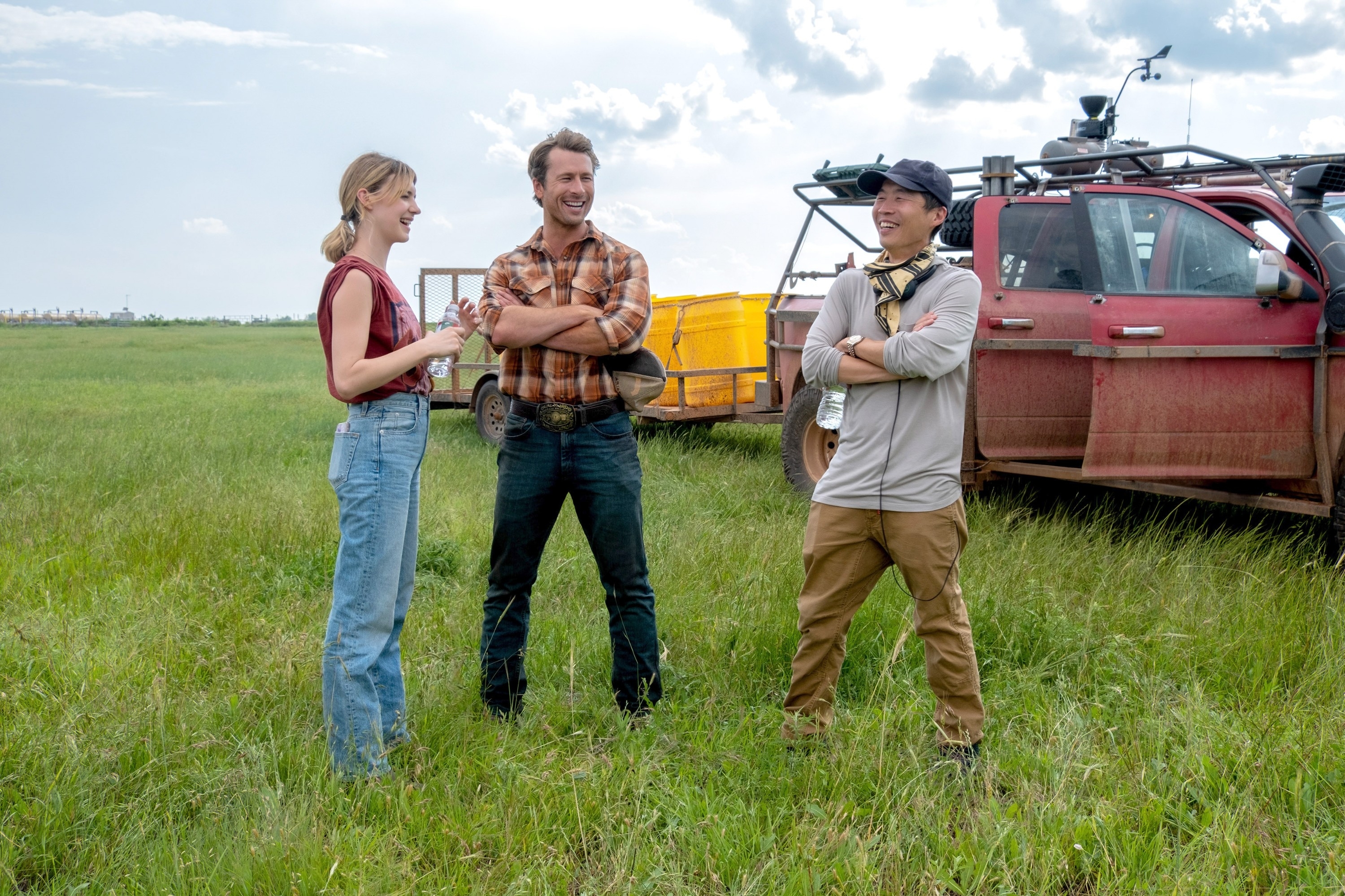 Daisy Edgar-Jones, Glen Powell, and Lee Isaac Chung behind the scenes filming &quot;Twisters&quot;