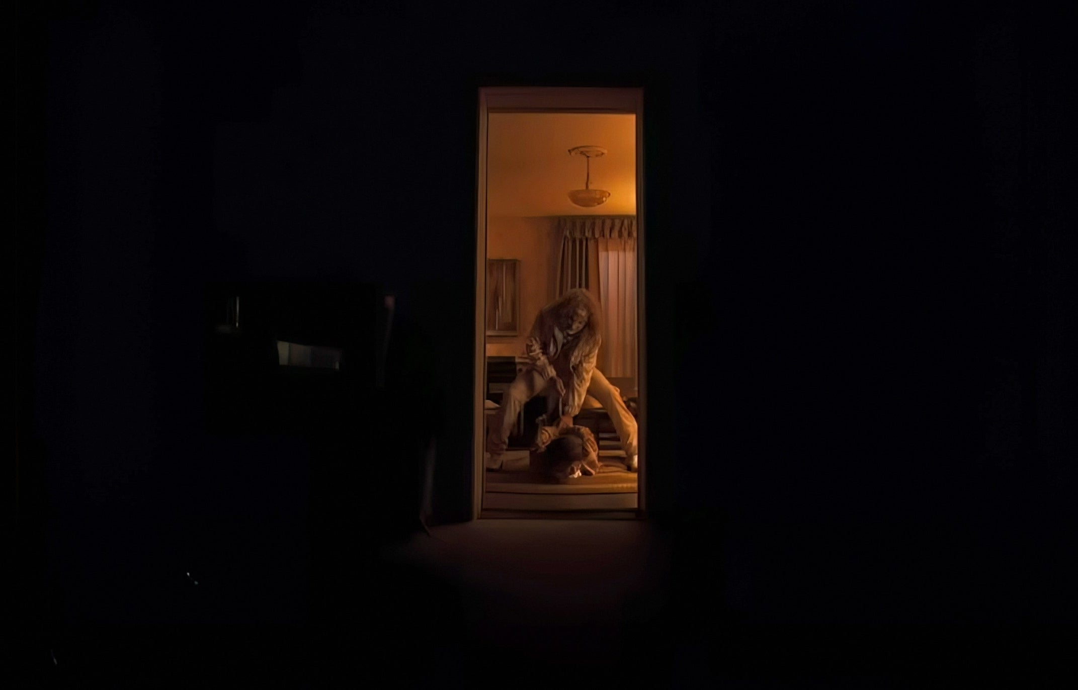 A creepy scene with crouched girl in the doorframe at the center of a dark room, lit by warm yellow light