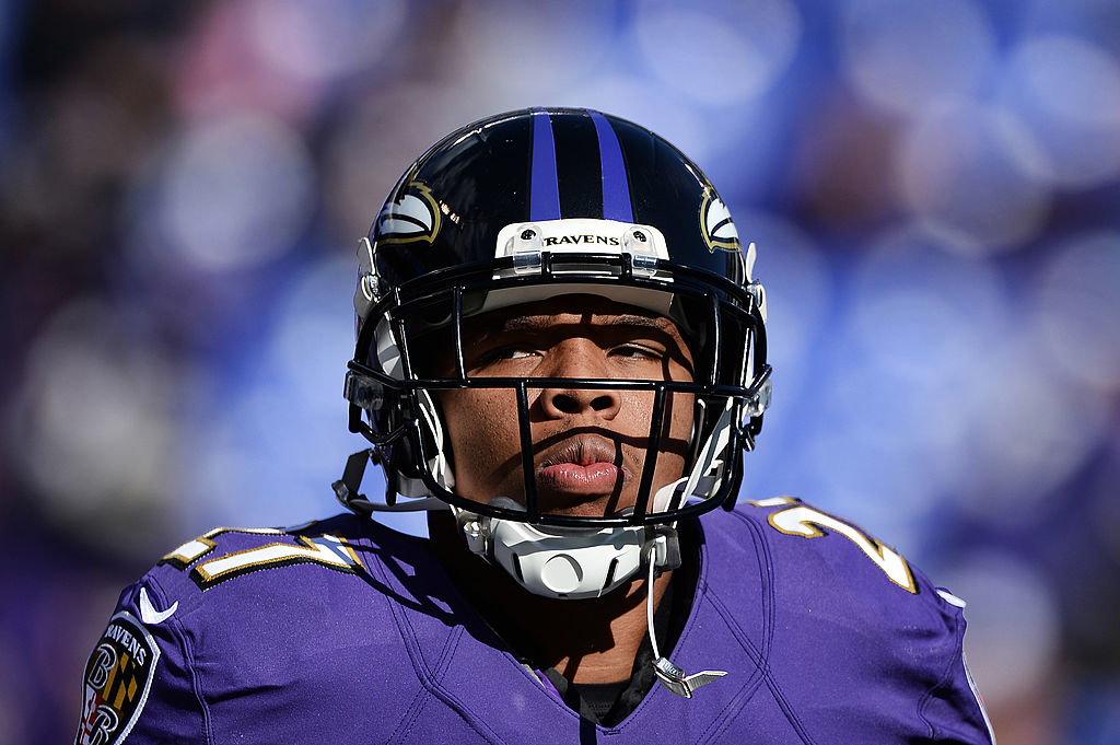 Ray Rice wearing a helmet and jersey with the number 27, focusing ahead during a game