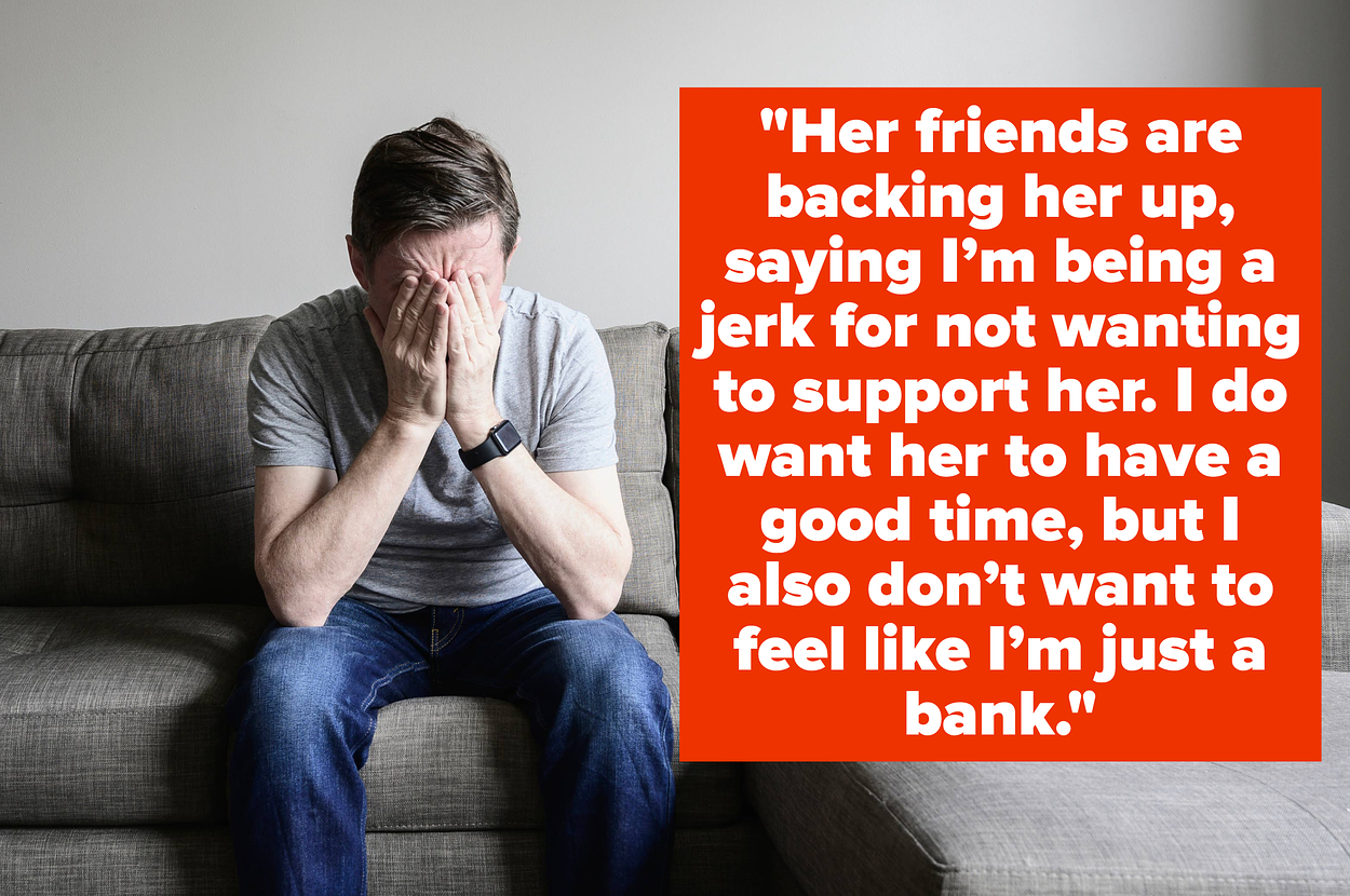 Distressed man covering face with hands, sitting on a couch. Text overlaid says, "Sarah's friends are backing her up, saying I'm being a jerk for not wanting to support her. I do want her to have a good time, but I also don't want to feel like I'm just a 