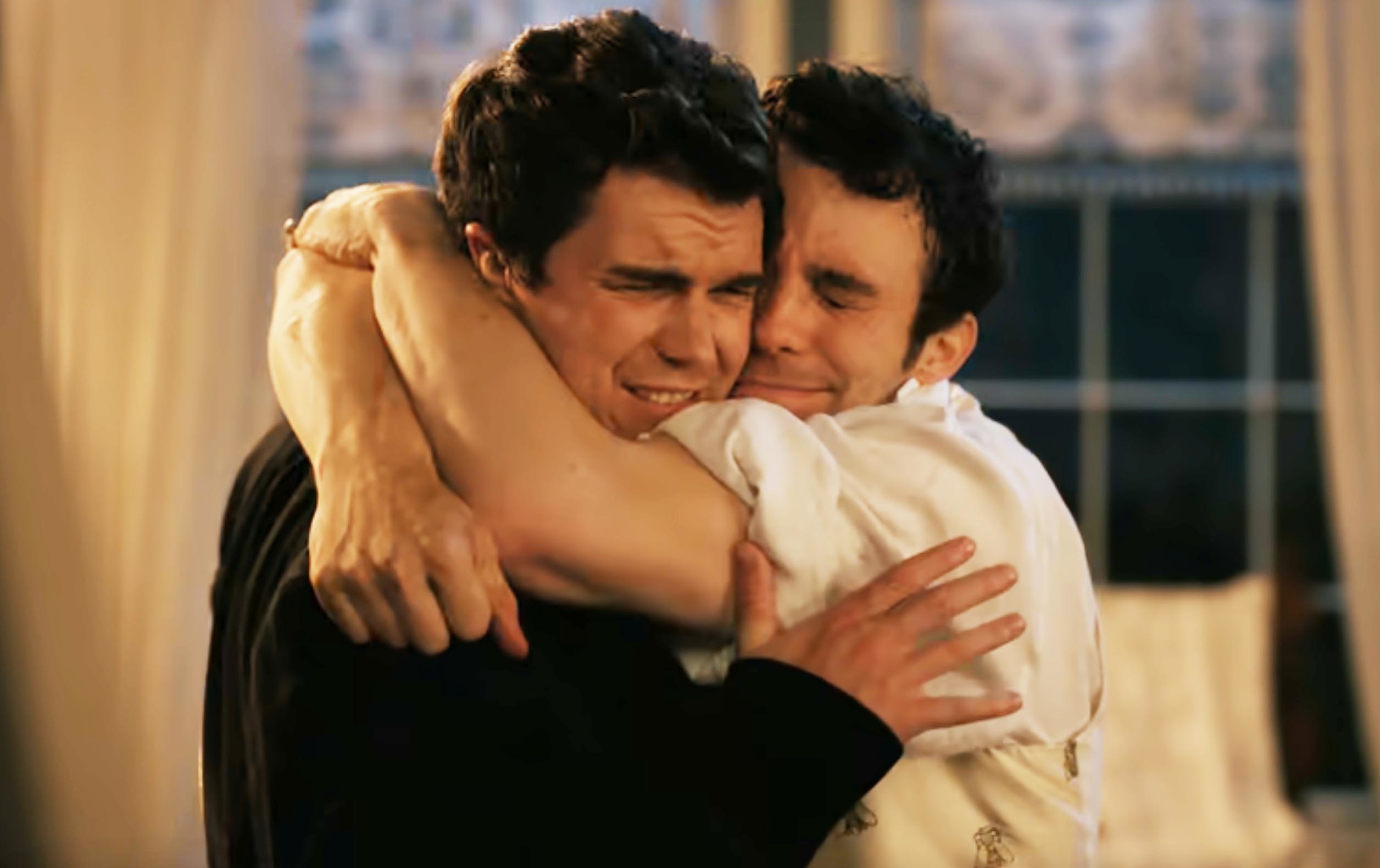 Colin and Benedict are hugging tightly, expressing intense feelings